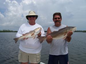 Stan and Joe with a double hookup of redfish....